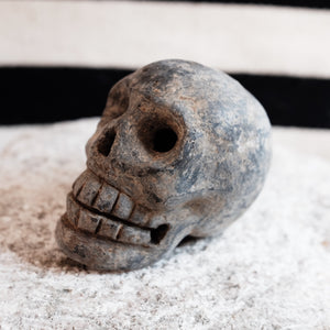 Hand made black clay skull incense holder